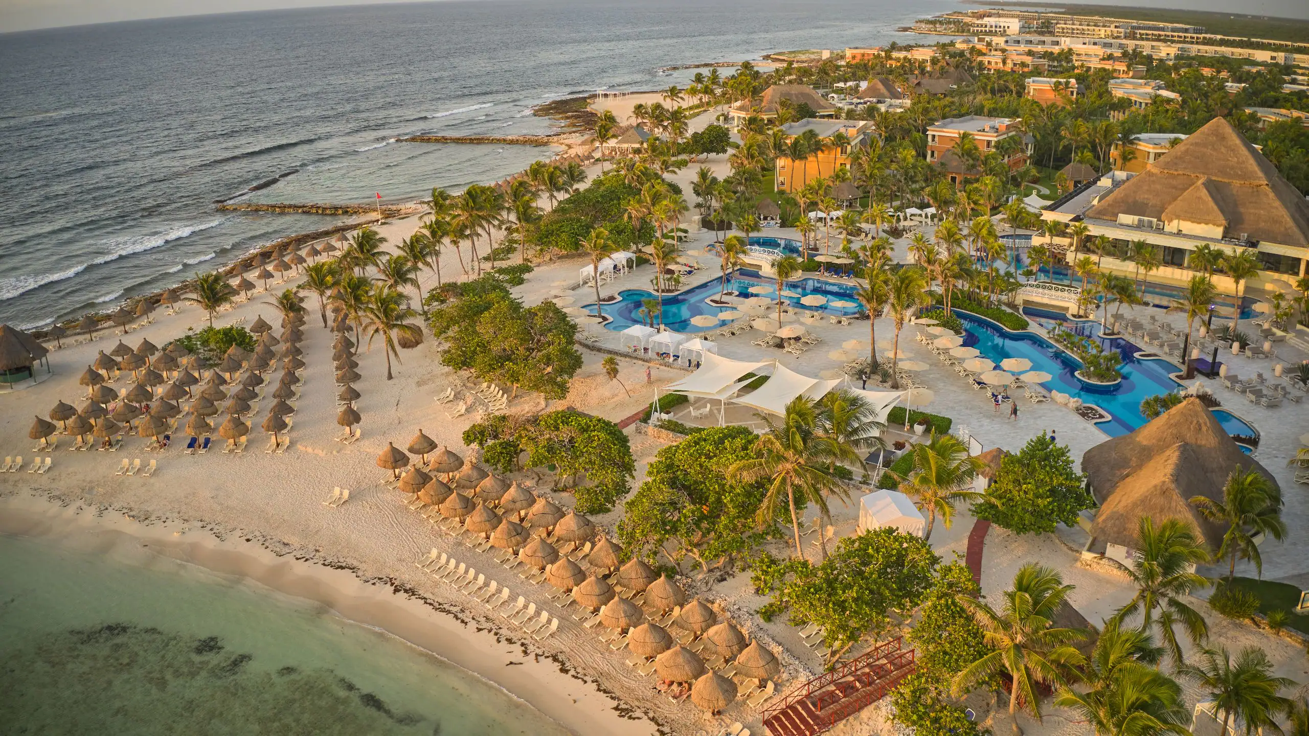 Bahia Principe Luxury Akumal adults-only all-inclusive resort in Akumal with beachfront pools, tropical gardens, and Caribbean Sea views.