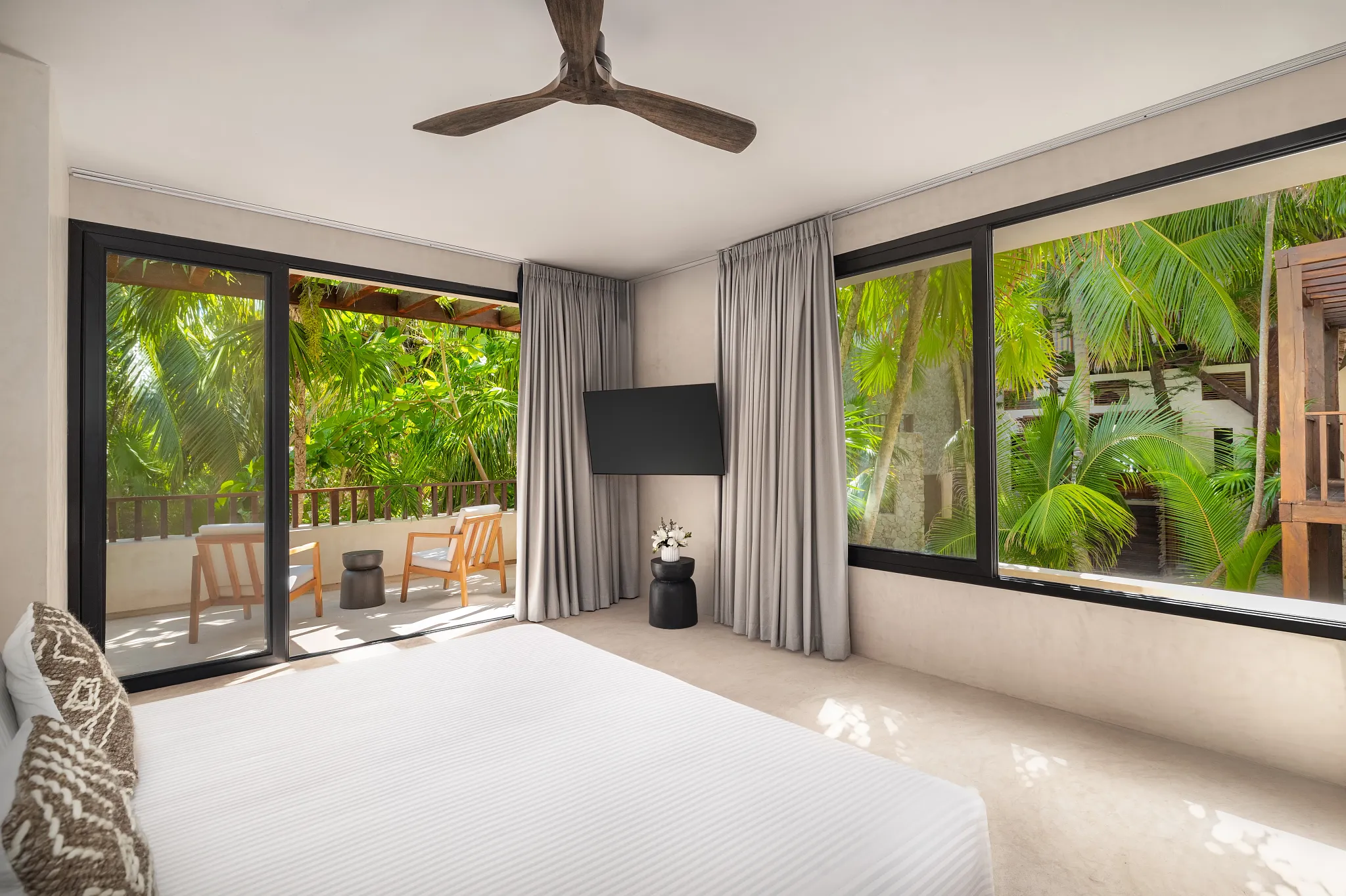 Casa Zamna Tropical View king bedroom at Secrets Tulum Resort & Beach Club with lush jungle surroundings and refined boutique-style interiors.