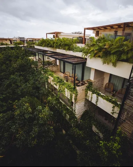 Copal Tulum Hotel boutique property surrounded by jungle with boho-chic design, intimate pool, and eco-conscious atmosphere in Tulum, Mexico.