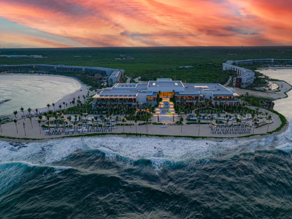 Hilton Tulum Riviera Maya All-Inclusive Resort with expansive pools, family-friendly amenities, and modern beachfront architecture on the Riviera Maya coast.