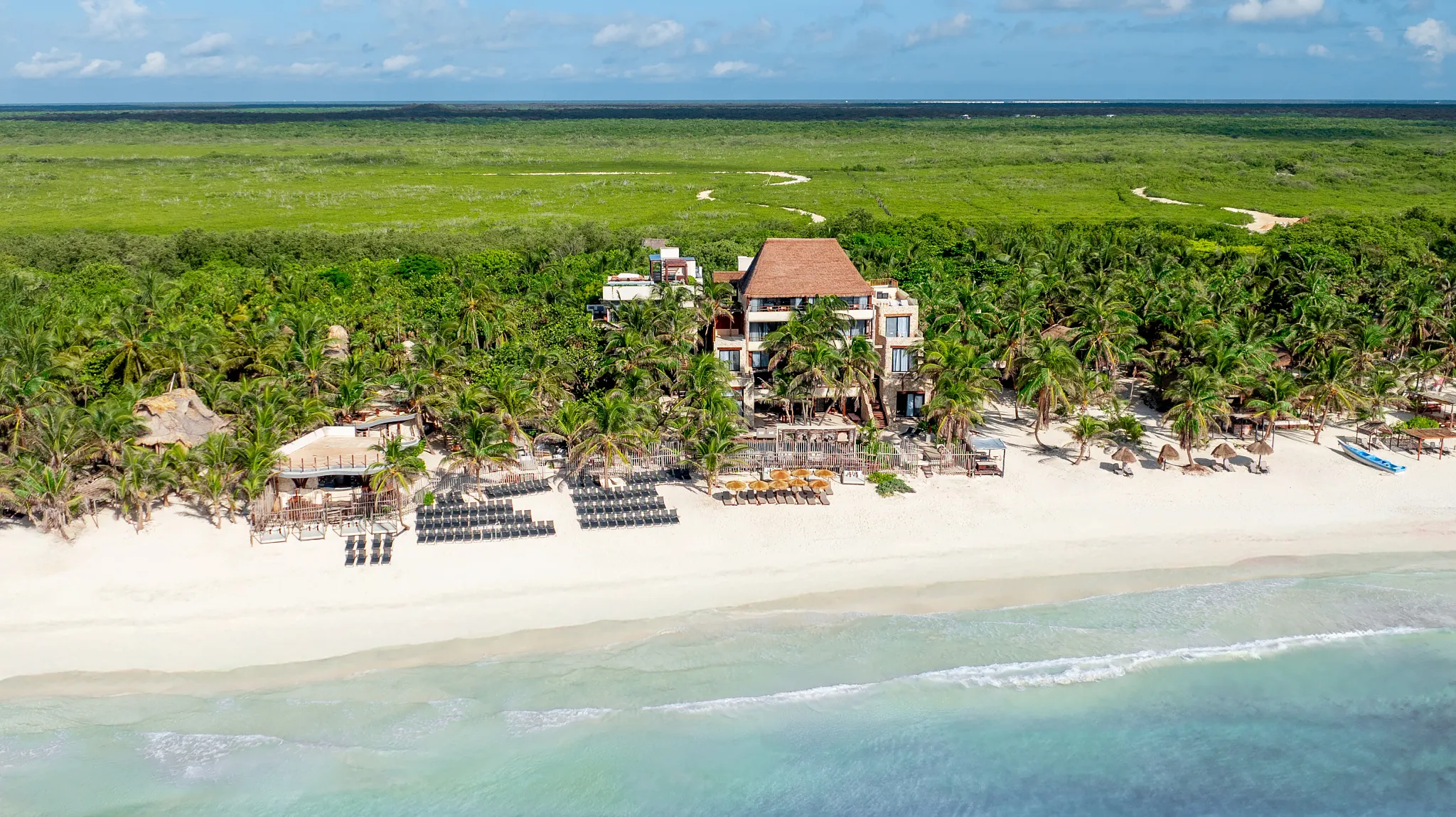 Secrets Tulum Resort and Beach Club adults-only all-inclusive resort with jungle-inspired architecture, beachfront pools, and Casa Zamná beach club.